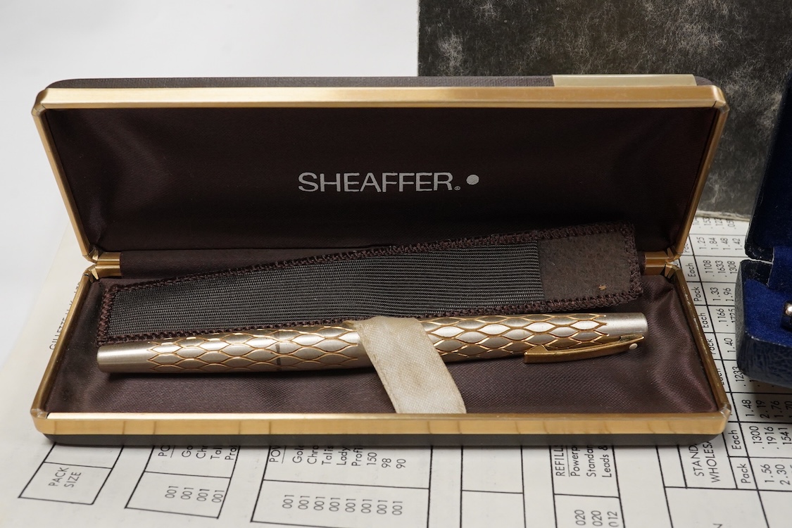 A folder of Parker and Sheaffer pens and ball pens, mostly boxed and a Parker Pen box containing eight items